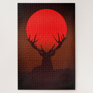 Silhouet van een hert met vurige rode zonsondergan legpuzzel