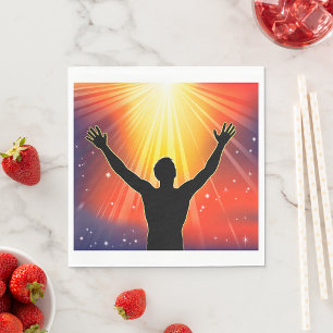 Silhouet van een spirituele man die zijn armen hef servet