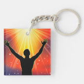 Silhouet van een spirituele man die zijn armen hef sleutelhanger (Achterkant)