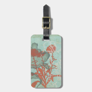 Silhouet van rode bloemen op een turquoise achterg bagagelabel