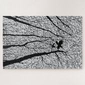 Silhouetraven in de winterbomen legpuzzel (Horizontaal)