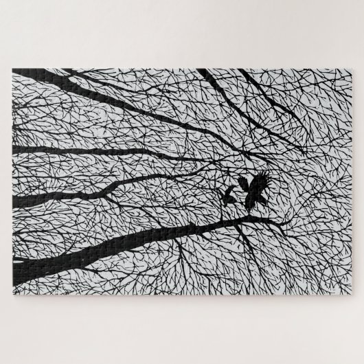 Silhouetraven in de winterbomen legpuzzel (Horizontaal)