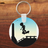 Silhouette boy skateboarden op straat sleutelhanger (Voorkant)