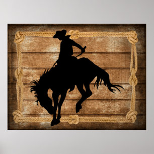 Silhouette cowboy op een bucking bronco paard poster