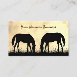 Silhouette Horses Grazing in het veld bij zonsonde Visitekaartje