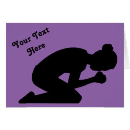Silhouette of Woman Kneeling in Prayer