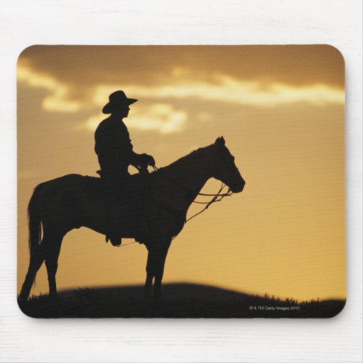 Silhouette van cowboy op horseback bij zonsonderga muismat (Voorkant)