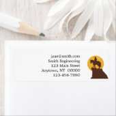 Silhouette van cowboy-rijdend paard bij zonsonderg etiket (Insitu)