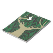 Silhouette van een hert, een duif en een ster tege notitieblok (Linkerzijde)