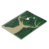 Silhouette van een hert, een duif en een ster tege notitieboek (Linkerzijde)