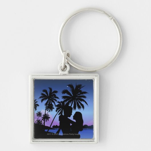Silhouette van een paar dat op het strand omarmt sleutelhanger (Voorkant)
