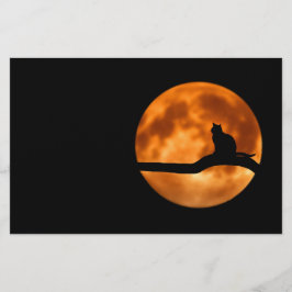 Silhouette van een zwarte kat in een boom briefpapier