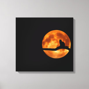 Silhouette van een zwarte kat in een boom canvas afdruk