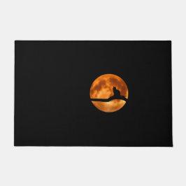 Silhouette van een zwarte kat in een boom deurmat