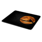 Silhouette van een zwarte kat in een boom snijplank (Hoek)