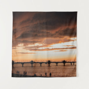 SILHOUETTE VAN MENSEN IN DE SUNSET WANDKLEED