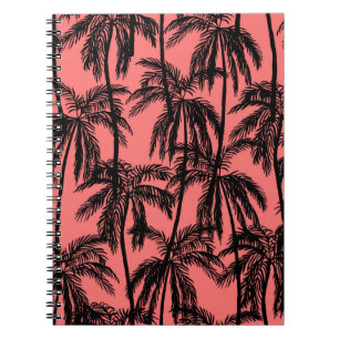 Silhouette van palmbomen op een roze achtergrond. notitieboek