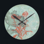 Silhouette van Rode Bloemen op Blauwgroen Achtergr Ronde Klok<br><div class="desc">Drie rode bloemen contrasteren tegen een blauwgroen achtergrond in dit schilderij van Megan Meagher. Een silhouet van een andere bloem leunt naar links van de druk. Een eenvoudig stuk met veel aan de hand. Dit zou een leuk cadeau zijn voor een vriend of geliefde die van kunst houdt!</div>