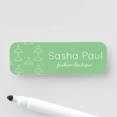 Silhouette witte hangers, groen naamplaatje (In situ)