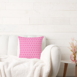 Silhouetten van kleine intense roze bananen op roz kussen