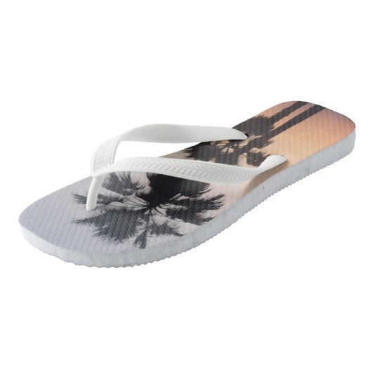 Silhouetten van palmbomen bij schemering teenslippers (Schuin)