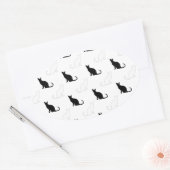 Silhouetten van zwarte en witte katten ovale sticker (Envelop)