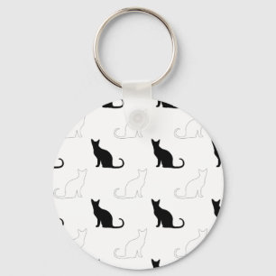 Silhouetten van zwarte en witte katten sleutelhanger