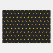 Silhouettes van kleine geelbananen op zwart inpakpapier vel (Voorkant 2)