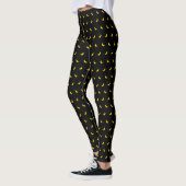 Silhouettes van kleine geelbananen op zwart leggings (Links)