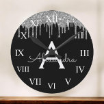 Silver Black Luxury Glitter Glam Monogram Naam Ronde Klok<br><div class="desc">Silver and Black Sparkle Glitter Monogram Name en Initiaal Luxury Wall Clock. Dit maakt de perfecte liefhebbende 16 verjaardag,  bruiloft,  vrijgezellenfeest,  verjaardagsdag,  baby shower of vrijgezellenfeest voor iemand die van luxe glam en stijl houdt.</div>