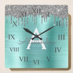 Silver Blauwgroen Glitter geborsteld Metaal Monogr Vierkante Klok<br><div class="desc">Silver and Teal Aqua Blue Faux Foil Metallic Sparkle Glitter Brushed Metal Monogram Name and Initial Luxury Wall Clock. This makes the perfect sweet 16 birthday,  wedding,  bridal shower,  verjaarary,  baby shower or bachelorette party gift for someone that loves glam luxury and chic styles.</div>