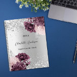 Silver burgundy florals elegant glamoureus 2023 planner<br><div class="desc">Faux zilverachtige achtergrond versierd met bruine en wazige roze bloemen,  en faux zilveren glitter,  sparkles. Personaliseren en een jaar,  naam en titel/tekst</div>