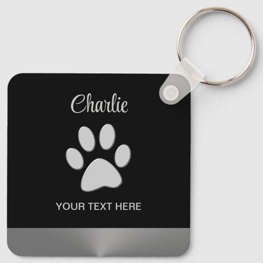 Silver Dog Paw op zwarte achtergrond Sleutelhanger (Achterkant)