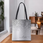 Silver Glitter Monogram Name Luxury Girly Tote Bag<br><div class="desc">Silver Faux Sparkle and Dripping Glitter Metallic Stainless Steel Folie Elegant Monogram Book Bag. Deze Book Bag kan worden aangepast om uw initiaal en voornaam op te nemen en wordt gegeven als cadeau voor Kerstmis,  Sweet 16 Birthday,  Vrijgezellenfeest of een bruiloft.</div>