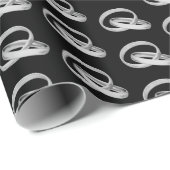 Silver Wedding Rings On Black Cadeaupapier (Rol Hoek)