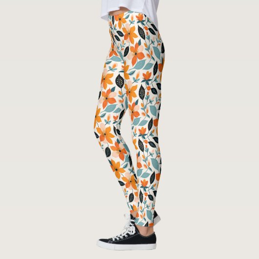 Sinaasappel en blauw gebladerte en bloemen leggings (Links)