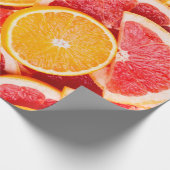 Sinaasappel- en grapefruitachtergrond, vers, rijp cadeaupapier (Hoek)