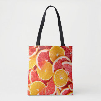 Sinaasappel- en grapefruitachtergrond, vers, rijp tote bag