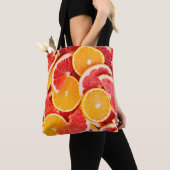 Sinaasappel- en grapefruitachtergrond, vers, rijp tote bag (Dichtbij)