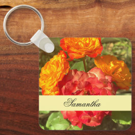Sinaasappel en rode bloementuin sleutelhanger