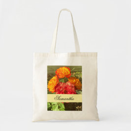 Sinaasappel en rode bloementuin tote bag