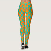 Sinaasappel en tel-groen abstract bladpatroon leggings (Achterkant)