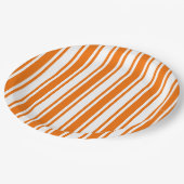 Sinaasappel en witte snoepjes strepen papieren bordje (Gekanteld)