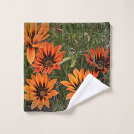 Sinaasappel en zwart Gazanias Gezicht Handdoek