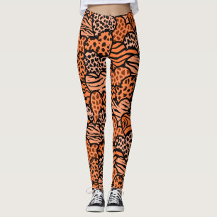 Sinaasappel en zwart meisjesprint harten polsje leggings