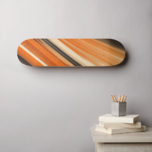 Sinaasappel en zwart skateboard