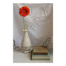 Sinaasappel gerbera en boeken poster