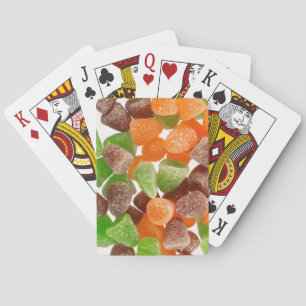Sinaasappel groene rode snoep, gestrooid met suike pokerkaarten