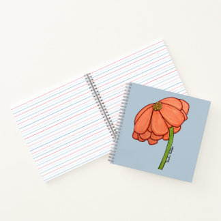 Sinaasappelbloem met blauwe achtergrond notitieboek