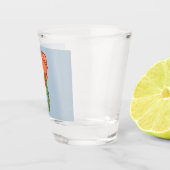 Sinaasappelbloem met blauwe achtergrond shot glas (Rechts)